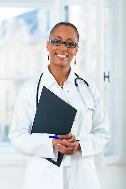 Healthcare professional - Smiling doctor with stethoscope